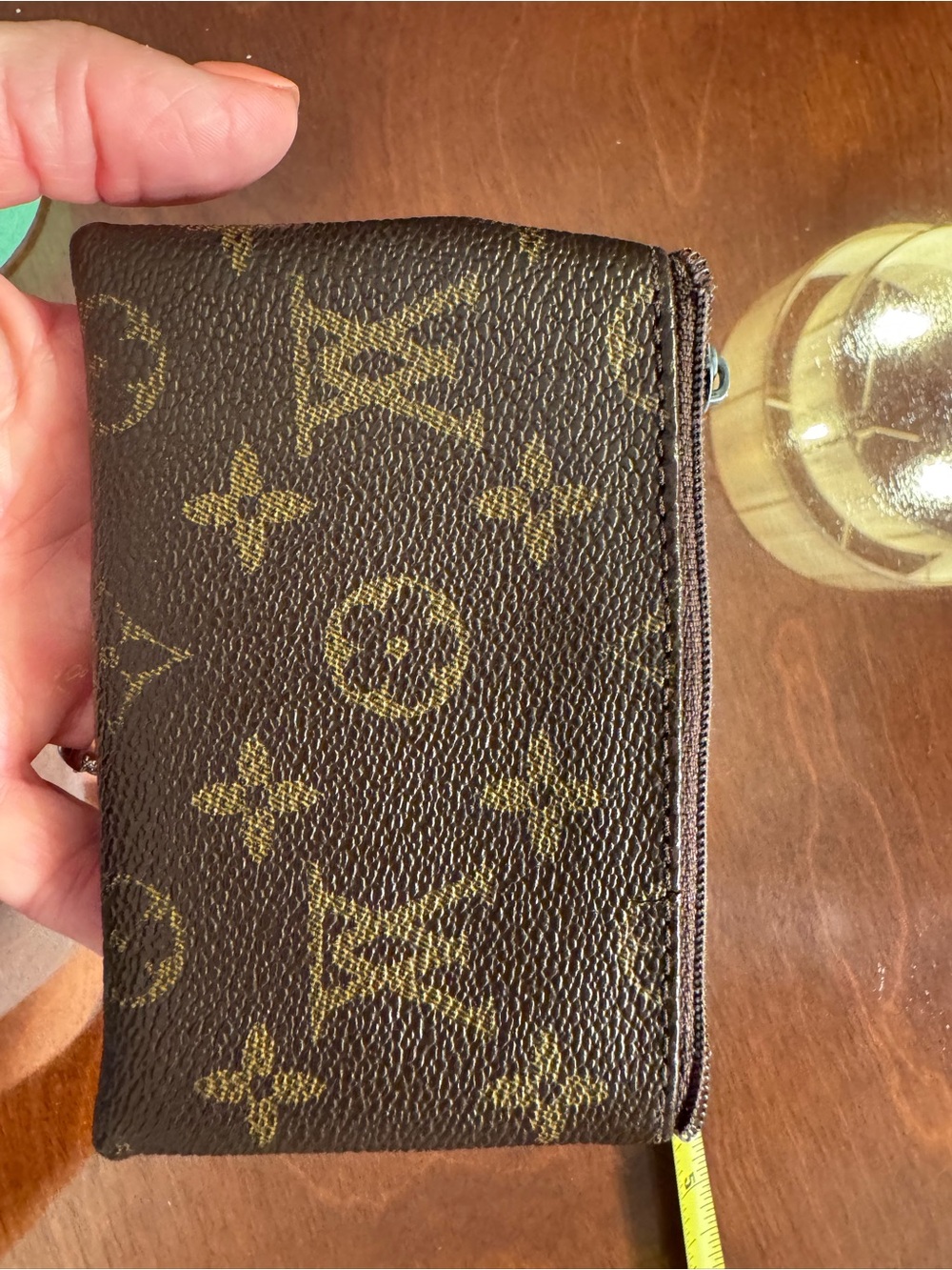 Monogram Zip Wallet in Brown and Gold needs zipper repair.